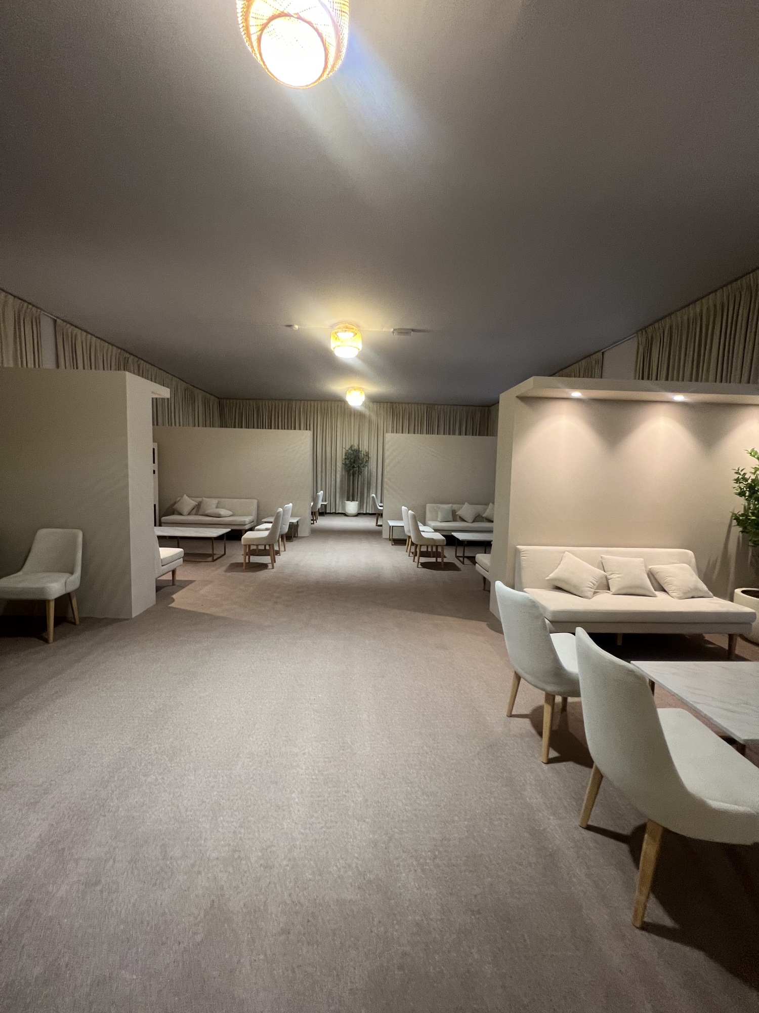 VVIP Royal Tent hospitality interior with cream seating and softly lit partitions, Formula 1 2025
